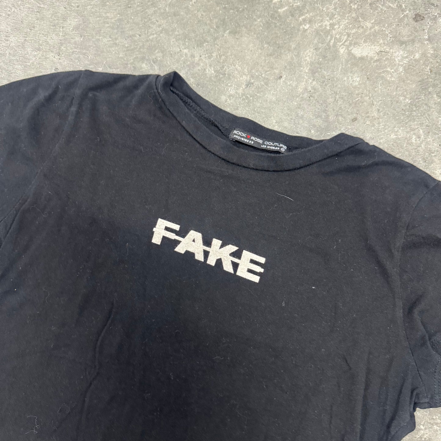 "FAKE" Baby Tee